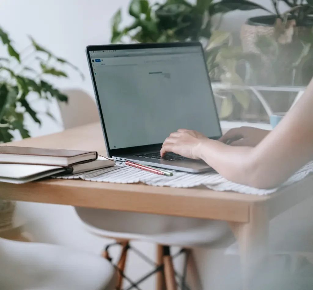 Content writer creating SEO blog content on a laptop